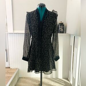 Floral dress with sheer long sleeves